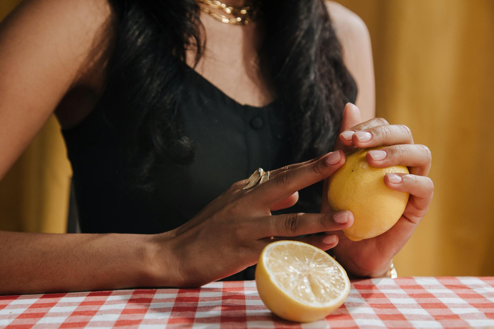 Close-up of hands holding a personal massager vibrator
