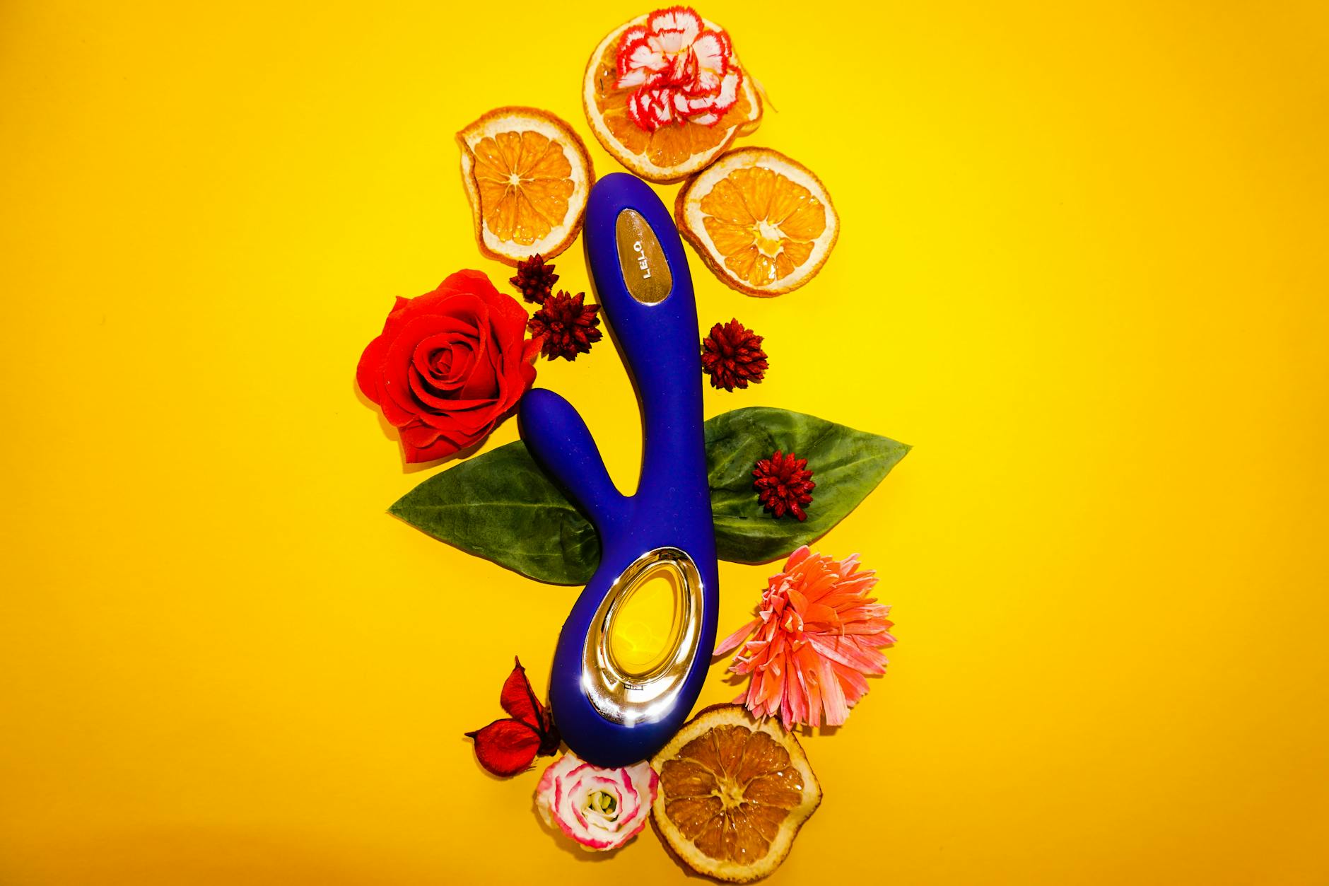 Two vibrant lemons on a minimalist white background, symbolizing freshness and the design philosophy of lemon vibrators